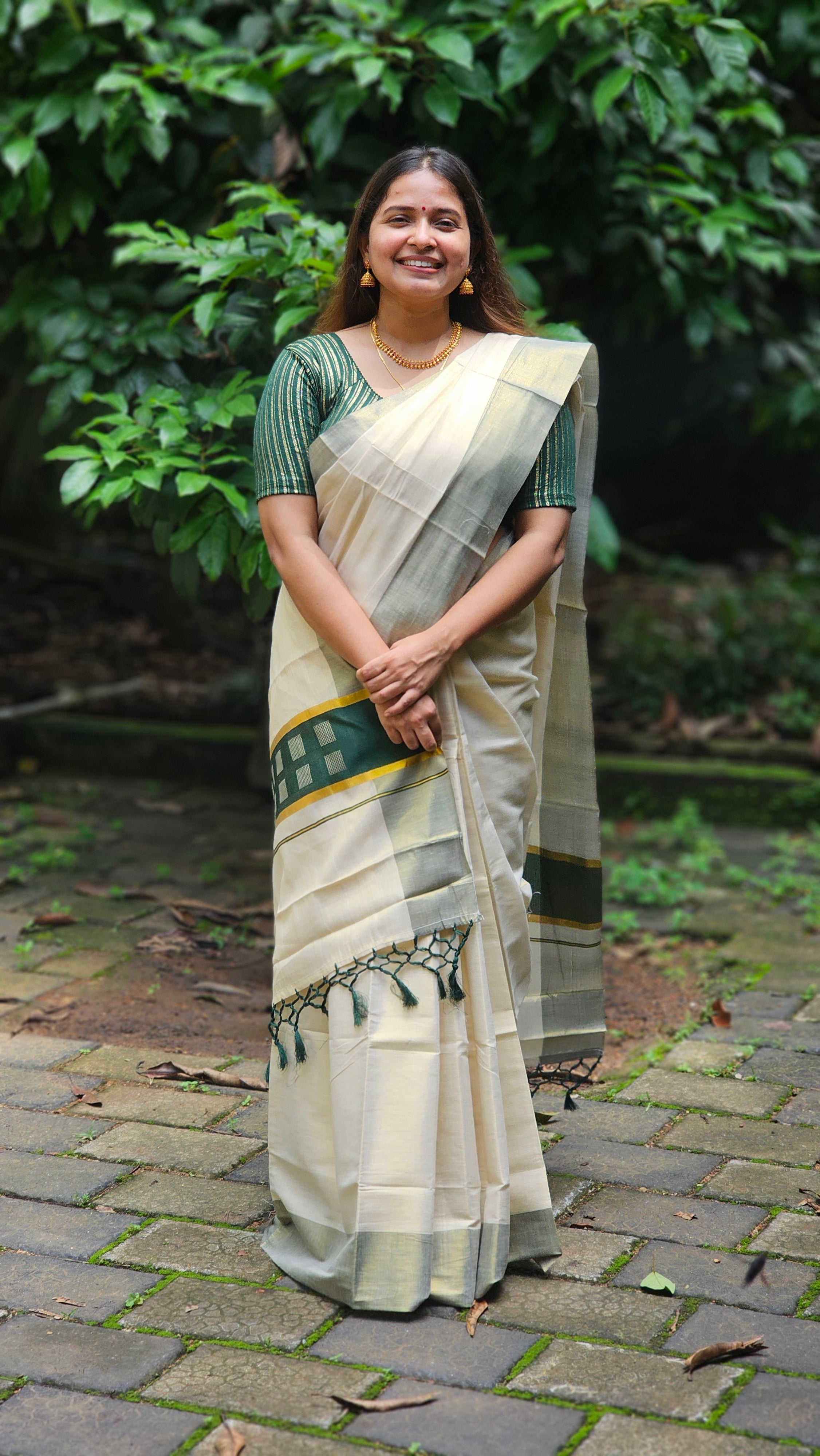 Kerala kasavu saree with green tassels - KM323