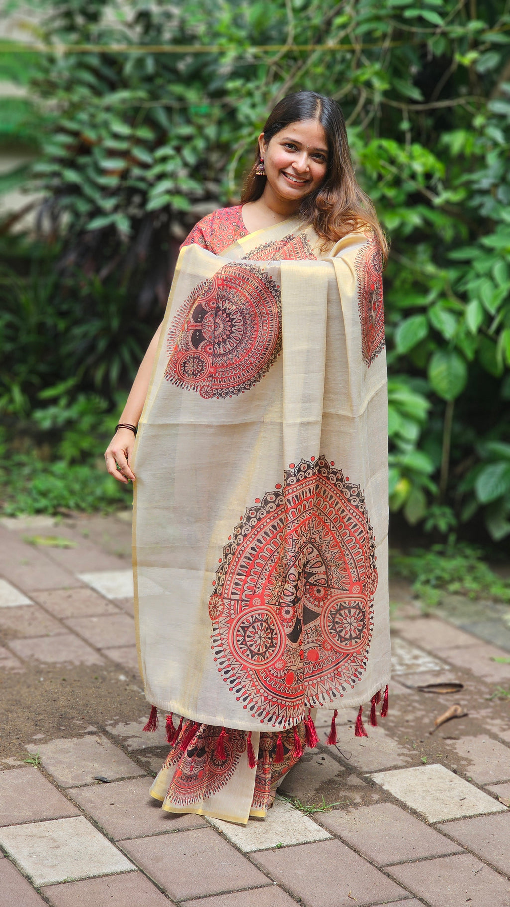 Rich mural print tissue saree with tassels - KM324