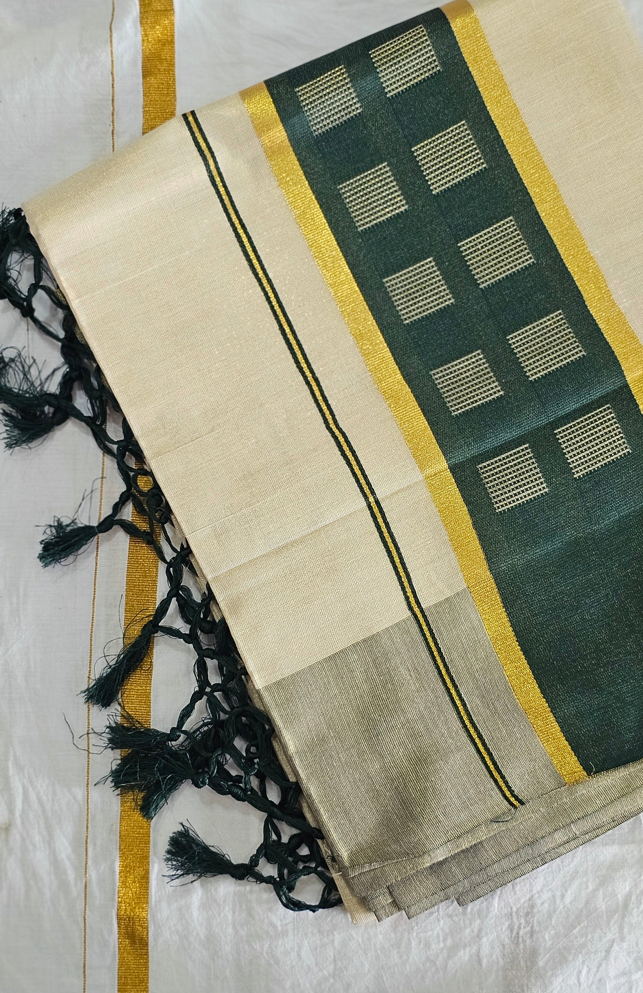 Kerala kasavu saree with green tassels - KM323