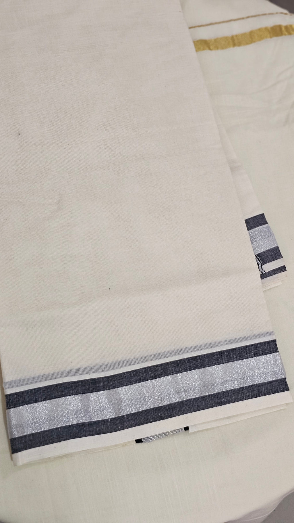 Silver kasavu with black borders set mundu  - KM 409