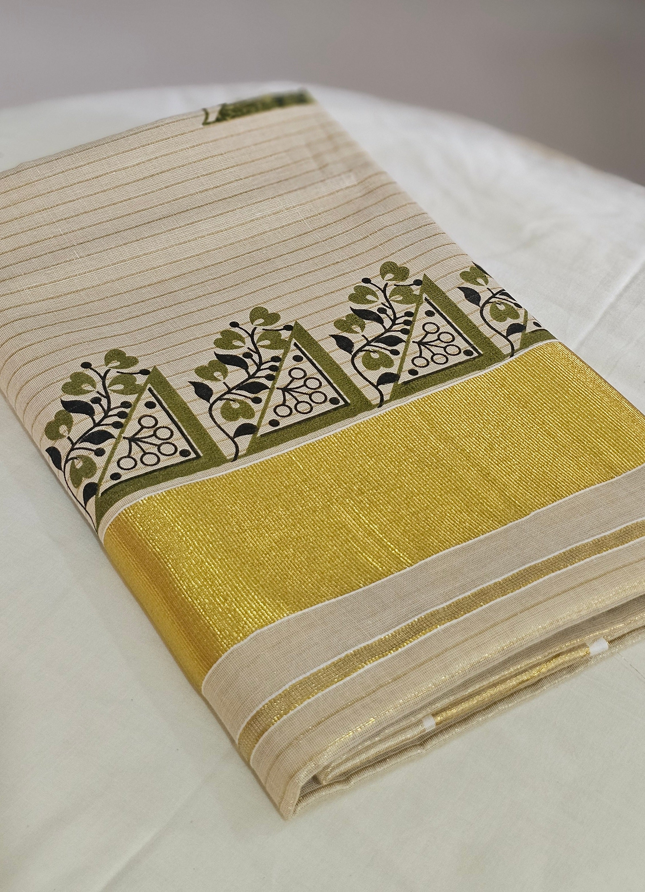 Striped kasavu saree with olive green & black prints - KM 422
