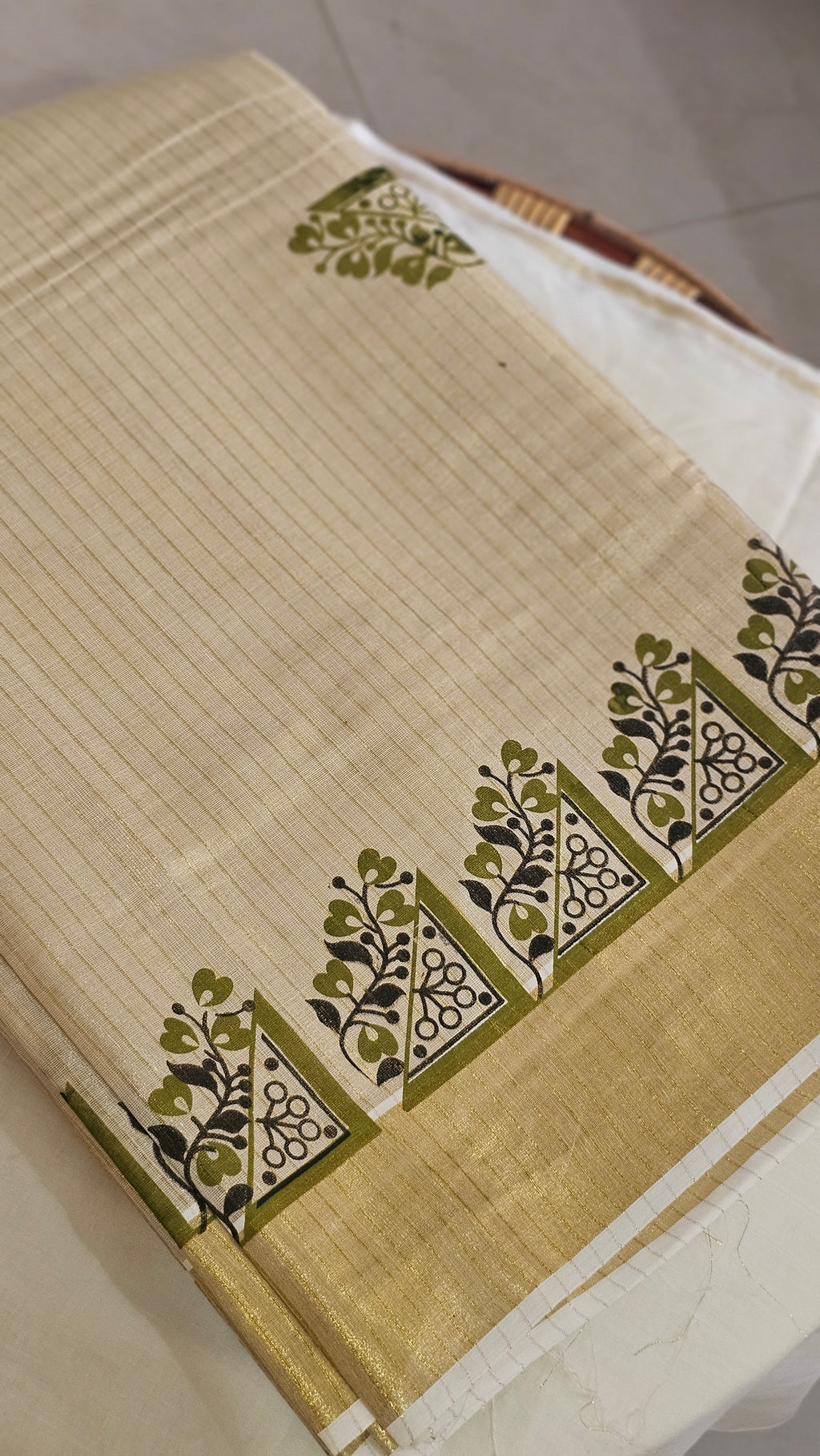 Striped kasavu saree with olive green & black prints - KM 422